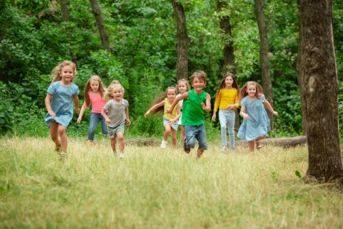 kids-children-running-green-meadow